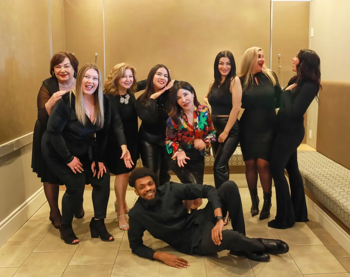 Dominic sharing a lighthearted moment with the AspireMD team during the shoot